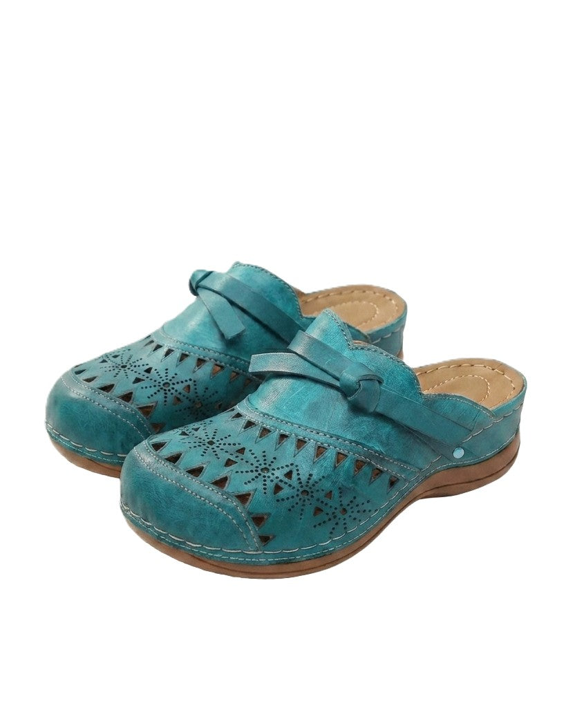 Runde Mules mit Schritt-Design